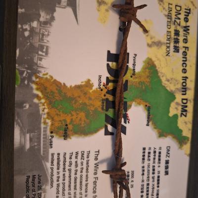 Framed section of wire from from DMZ - post korean war
