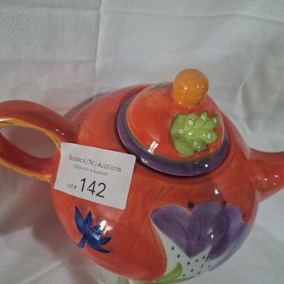 Teapot- reddish orange with floral design