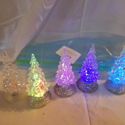 acrylic Christmas trees with color changing LED lights.
