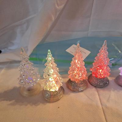 acrylic Christmas trees with color changing LED lights.