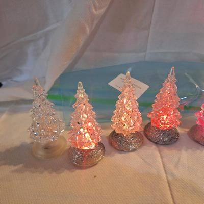 acrylic Christmas trees with color changing LED lights.