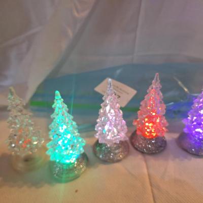 acrylic Christmas trees with color changing LED lights.