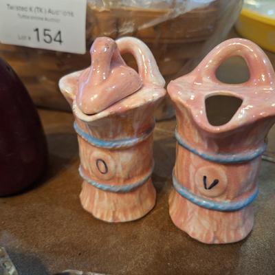 salt and pepper shakers, oil and vinegar bottles and Longaberger basket