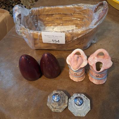 salt and pepper shakers, oil and vinegar bottles and Longaberger basket