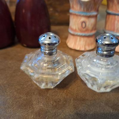 salt and pepper shakers, oil and vinegar bottles and Longaberger basket