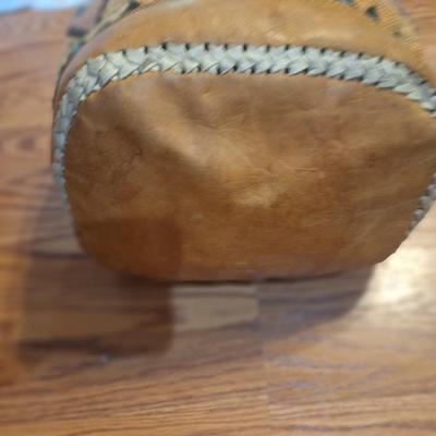 Bohemian style backpack handbag with leather and other material.
