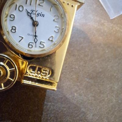 small golden tone Elgin clock shaped like train