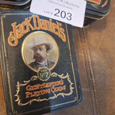 empty jack Daniels tins