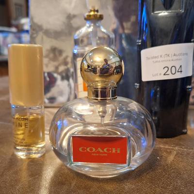 4 bottles of perfume, the coach perfume is approx. 1/4 full