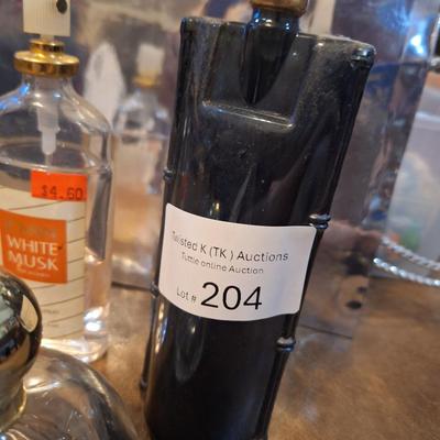 4 bottles of perfume, the coach perfume is approx. 1/4 full