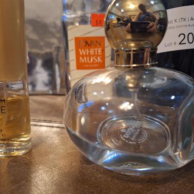 4 bottles of perfume, the coach perfume is approx. 1/4 full