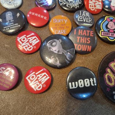 various buttons or pins
