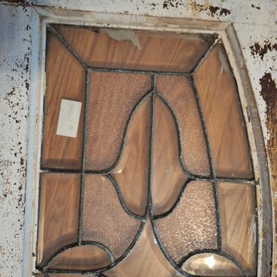 Decorative glass window or glass that was above a door. It has some damage, please see all photos