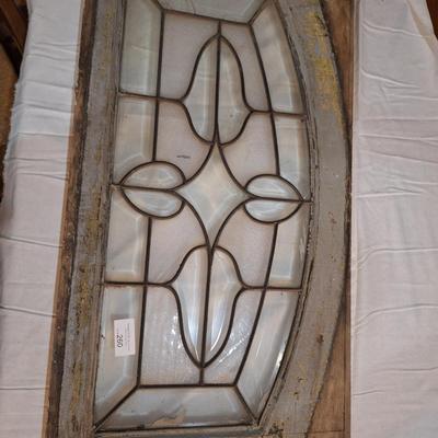 Decorative glass window or glass that was above a door. It has some damage, please see all photos