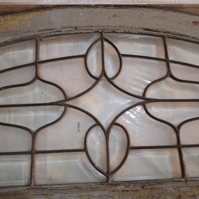 Decorative glass window or glass that was above a door. It has some damage, please see all photos