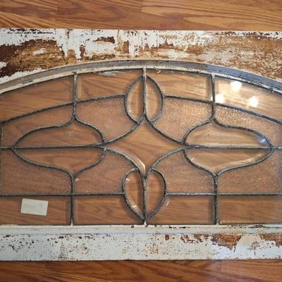 Decorative glass window or glass that was above a door. It has some damage, please see all photos