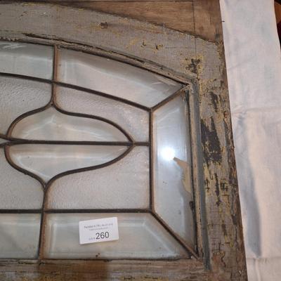 Decorative glass window or glass that was above a door. It has some damage, please see all photos