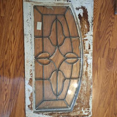 Decorative glass window or glass that was above a door. It has some damage, please see all photos
