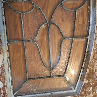 Decorative glass window or glass that was above a door. It has some damage, please see all photos