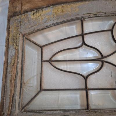 Decorative glass window or glass that was above a door. It has some damage, please see all photos