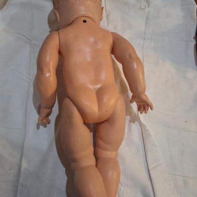 large vintage baby doll with eyes that open and close