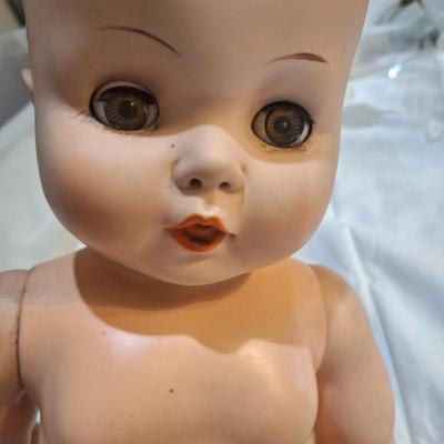 large vintage baby doll with eyes that open and close