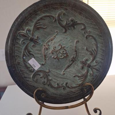 large metal decorative plate with stand