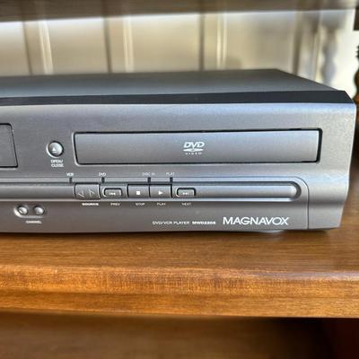 DYNEX 32” LED TV, MAGNAVOX DVD/VHS COMBO PLAYER AND A STAND