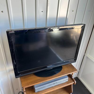 DYNEX 32” LED TV, MAGNAVOX DVD/VHS COMBO PLAYER AND A STAND