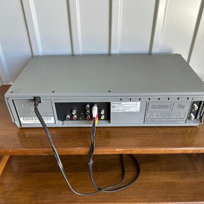 DYNEX 32” LED TV, MAGNAVOX DVD/VHS COMBO PLAYER AND A STAND