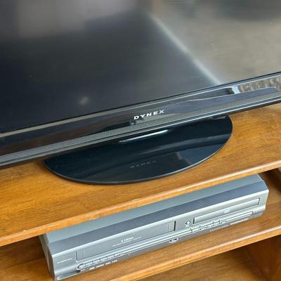 DYNEX 32” LED TV, MAGNAVOX DVD/VHS COMBO PLAYER AND A STAND