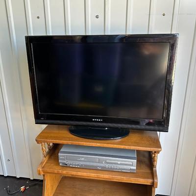 DYNEX 32” LED TV, MAGNAVOX DVD/VHS COMBO PLAYER AND A STAND