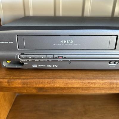DYNEX 32” LED TV, MAGNAVOX DVD/VHS COMBO PLAYER AND A STAND
