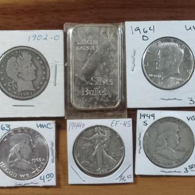1 silver round 5 silver 1/2 dollars