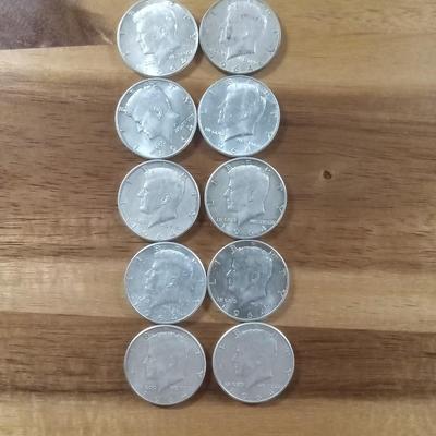 10 Kennedy silver half dollars
