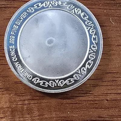 1 oz .999 silver round