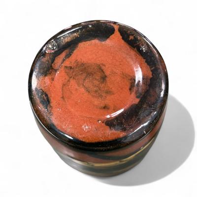 Sale Photo Thumbnail #1055: Peters and Reed Marbleized Pattern Vase.  This vase features a marbleized pattern with hues of terra cotta, moss green, black and yellow.  Approximately 98" tall, 3' base, and 3.25 " opening