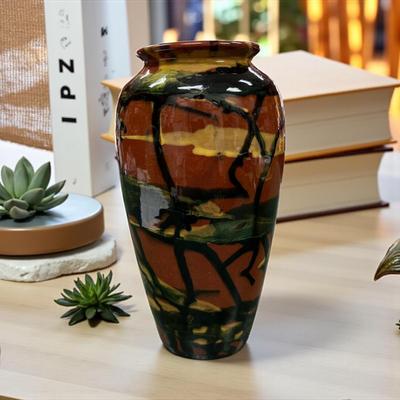 Sale Photo Thumbnail #1057: Peters and Reed Marbleized Pattern Vase.  This vase features a marbleized pattern with hues of terra cotta, moss green, black and yellow.  Approximately 98" tall, 3' base, and 3.25 " opening