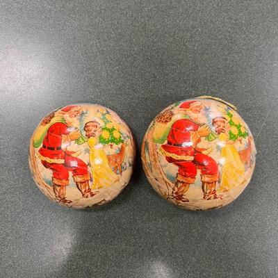 Sale Photo Thumbnail #1073: Vintage Christmas Candy Container/ornament.  Depicts Santa and a child with a Christmas Tree.  Made of Paper Mache in West Germany