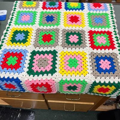 Sale Photo Thumbnail #1117: Crocheted Afghans Set Of 2
Squares 30"X40"   Yellow Border 46"x60"   Yellow Border has damage see photo