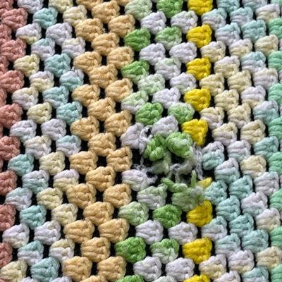 Sale Photo Thumbnail #1114: Crocheted Afghans Set Of 2
Squares 30"X40"   Yellow Border 46"x60"   Yellow Border has damage see photo