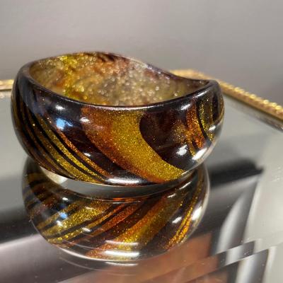 Stunning gold, orange, brown swirl Bakelite bracelet