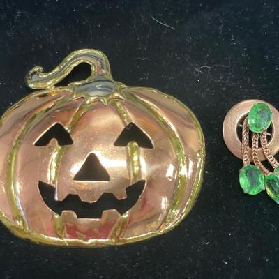 Copper pumpkin and small brooches