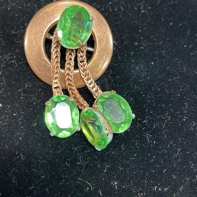 Copper pumpkin and small brooches