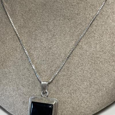 2 sterling necklaces with black onyx and red stone