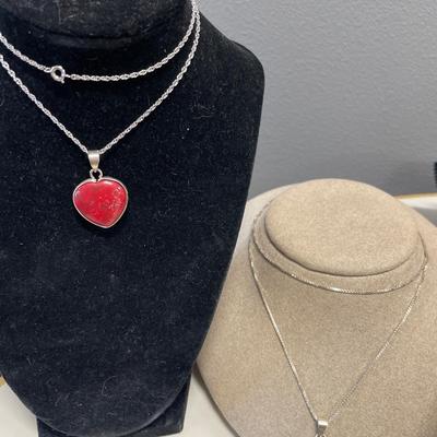 2 sterling necklaces with black onyx and red stone