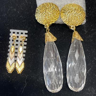 Gold tone and long crystal earrings with more
