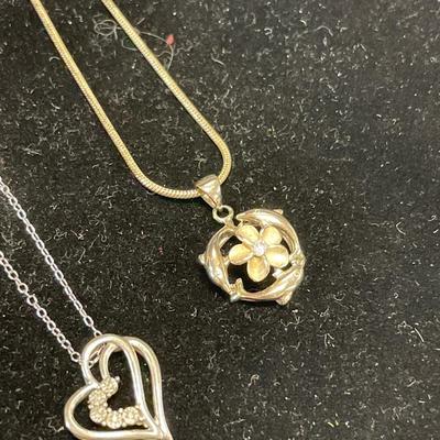 2 sterling pendants and chains