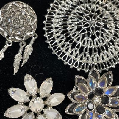 6 silver tone brooches and pins