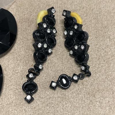Black leather earrings and more
